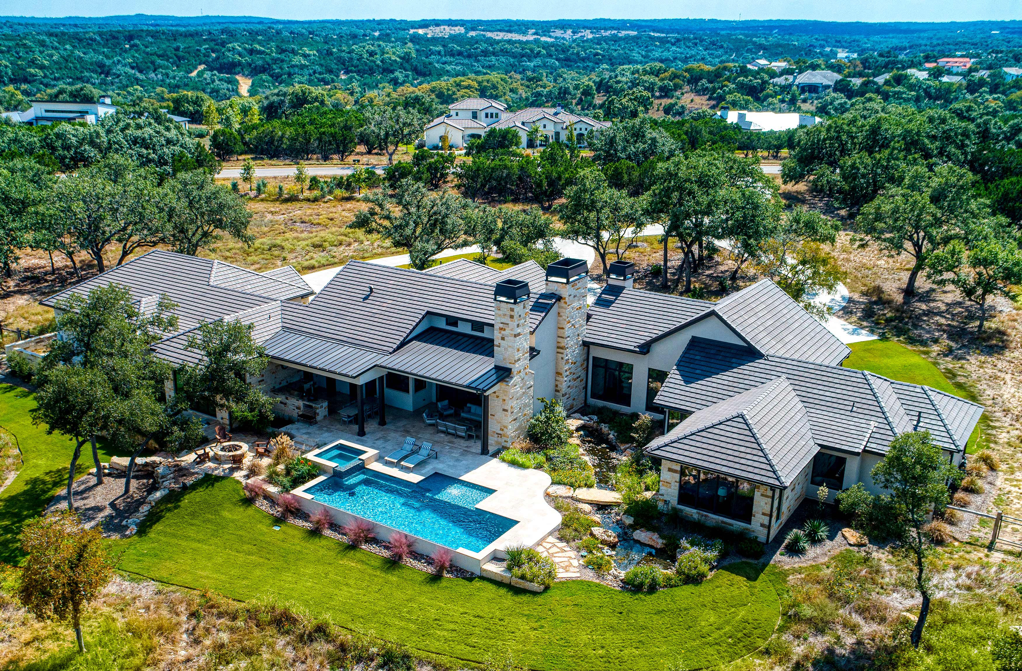 Custom home with outdoor living areas built by Boerne Builder Garner Homes